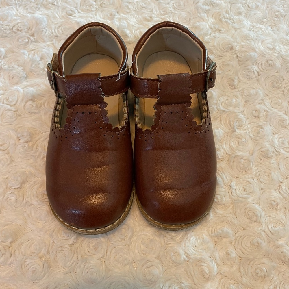 Brown scalloped leather dress shoes
